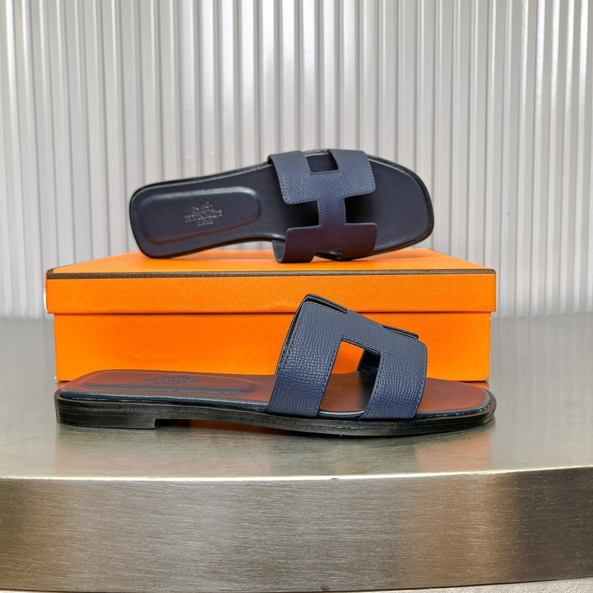HERMES 0RAN SANDAL IN DARK BLUE CALFSKIN