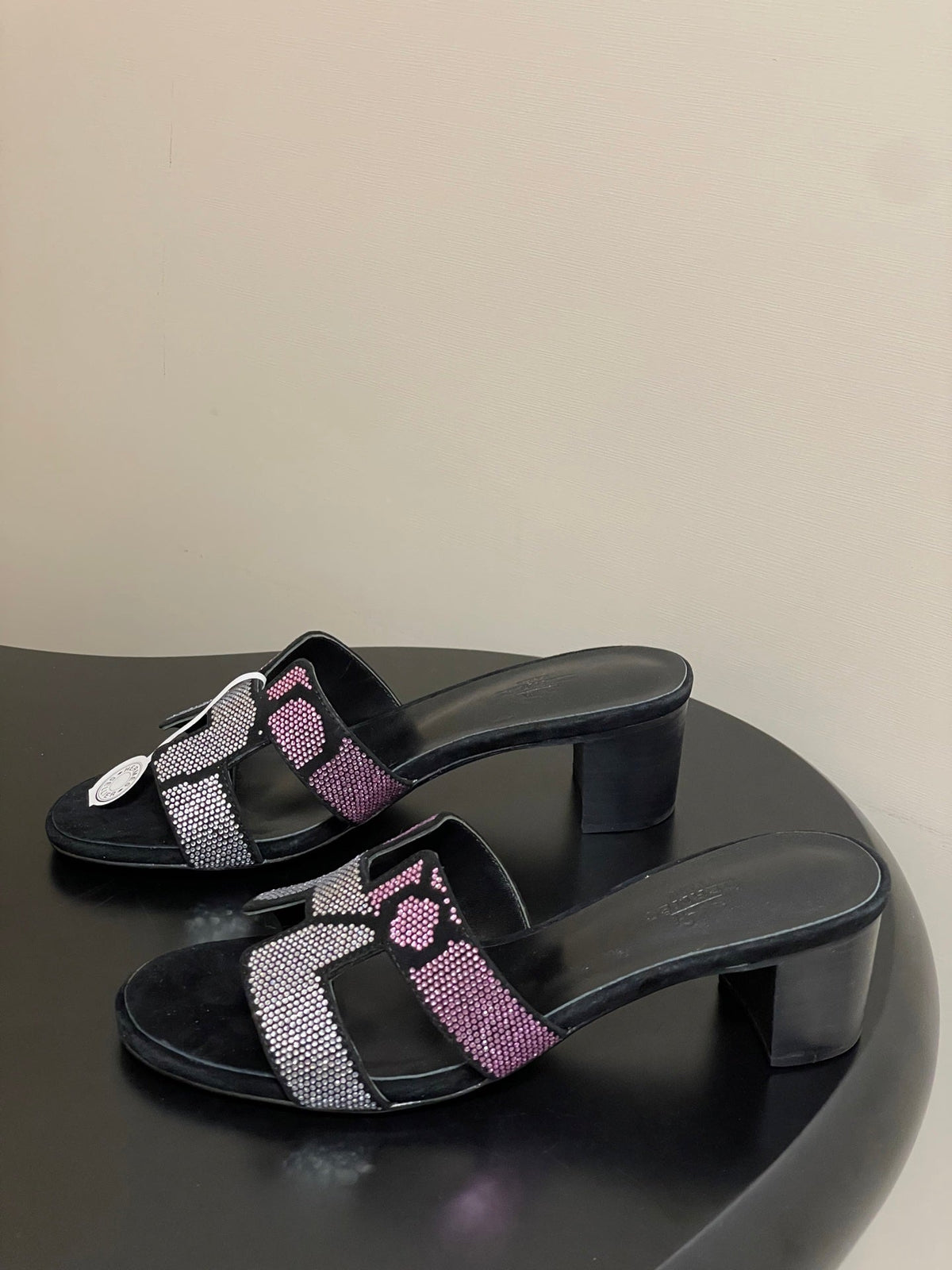 HERMES 25S ORAN HIGH‑HEEL SANDAL 50 MM IN BLACK LAMBSKIN WITH WHITE MIX PINK STONE DETAILS